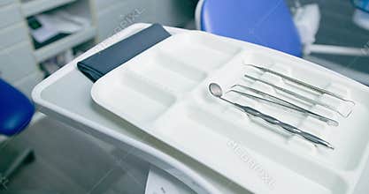 Sterile Dental Instruments on a Tray: Ready for Patient Care in a Modern Dental Clinic