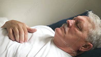 Reclining man with chest pain