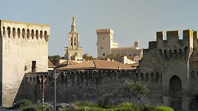 View of the Palais des Papes and the city wall in Avignon France