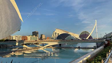 City of Arts and Sciences in Valencia, Spain. Camera glides along Palau de les Arts Reina Sofia. Golden hour light.