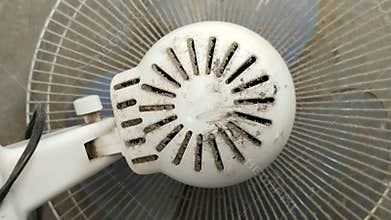 Dust that accumulates on the engine cover or fan