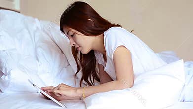 Asian teenage talking and chat by Tablet