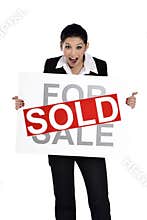 Real estate woman holding for sale - sold sign