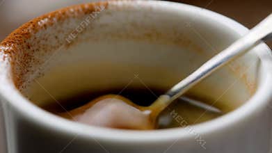 Stirring coffee mug marshmallow melting hot beverage cozy morning breakfast stock footage Generative AI