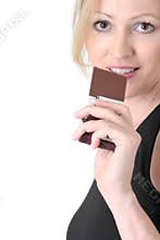 Woman about to eat a chocolate bar