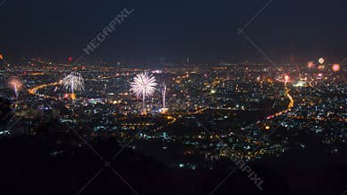 New Year Celebration Fireworks Over CityScape Of Chiang Mai, Thailand