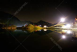 Night sky over Balea Lake, Transylvanian Alps, Romania