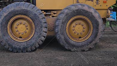 Construction machinery operating on road project in india, odisha.