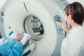 Preparing CT scanner for senior patient