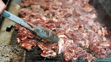 Kambing Golek Marinated Goat Meat Being Grilled