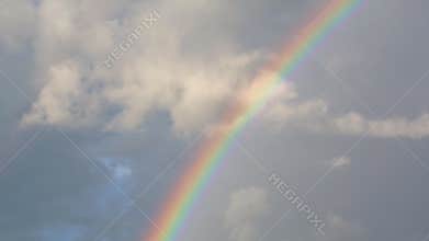 Rainbow In Sky And Raincloud
