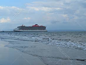 Puntarenas, Puerto Rico 2026.03.28. - Virgin Voyages Brilliant Lady docked in the port on a cloudy day