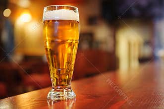 Glass of beer on the bar