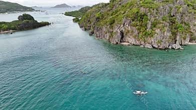 POI drone shot of local fishermen fishing near the island coast of Lin
