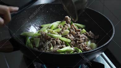 Thai Pad See Ew Stir-fried Flat Rice Noodles with Marinated Pork and Dark Soy Sauce on Home Stove