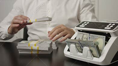 Businessman counting dollars close-up. Banker counting money. Office scene with hands count money. Counting cash close up. Finance