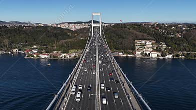 Aerial view of traffic crossing bosphorus bridge in istanbul