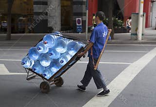 Transporting drink barreled water with cart