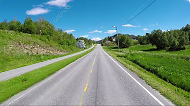 Driving a Car on a Road in Norway
