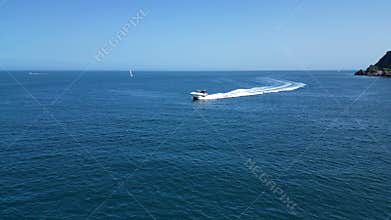 Torbay, South Devon, England: DRONE VIEWS: A motor boat cruises across the bay