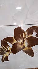 White marble tiles with brown lily flower decoration