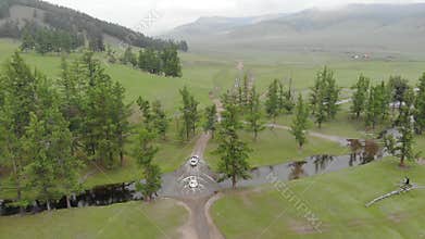 Two white SUVs cross a river on a dirt road through Siberian taiga meadow terrain, vehicle, crossing, convoy, off road