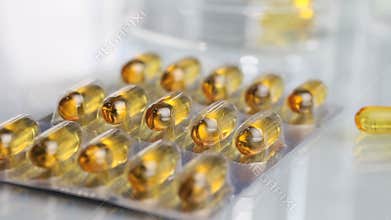 Vitamins supplements pills omega 3 on table