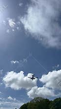 Aircraft flying over Amsterdam Forest park near Schiphol Airport, Netherlands