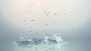 Water bubbles and action over white background
