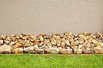 Horizontal lawn border with rocks