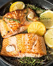 Grilled salmon with herbs, garlic and lemon. FIsh food