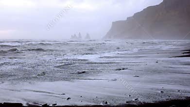 Huge arched black sand beach in Iceland