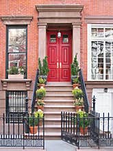 Entrance with ornate railings and gate