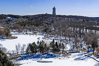 Early Spring Snow - View of the Tower at Jingyuetan National Forest Park, Changchun, China