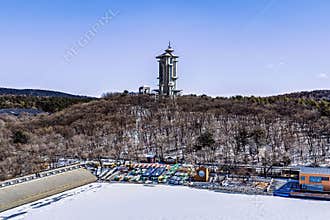 Early Spring Snow - View of the Tower at Jingyuetan National Forest Park, Changchun, China