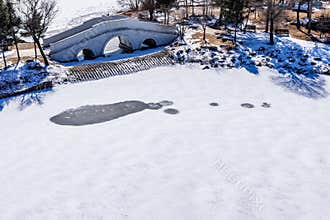 Early Spring Snow - Yulun Bridge Scenery in Jingyuetan National Forest Park, Changchun, China