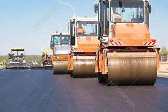 Road rollers machines compacting fresh asphalt