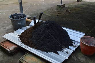 High Angle View of Organic Soil Media and Gardening Implements
