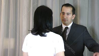 A husband embrace his sad wife