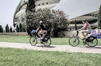 People going about their daily lives in the streets of the city of Valencia