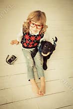 Hipster kid and dog