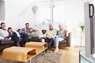 Multi Generation Family Watching TV Together