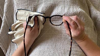 Cleaning glasses very carefully