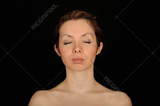 Woman with eyes closed