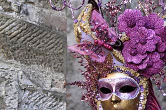 Golden mask with flowers and pink butterfly, the Venice Carnival