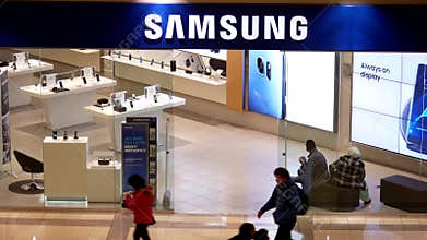 Top shot of customer shopping at Samsung store