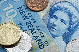 Ten new zealand dollar with coins
