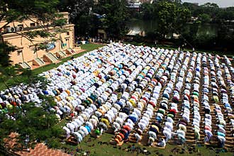 Muslim prayer. A group of Muslim are praying.