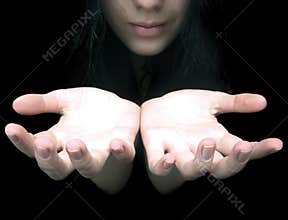 Hands in darkness