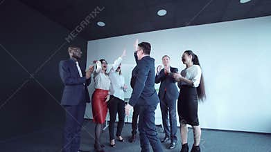 Boss congratulating team